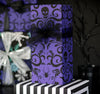 Purple Damask Gothic Gift wrapping paper with skulls, spiders, bats, and scorpions